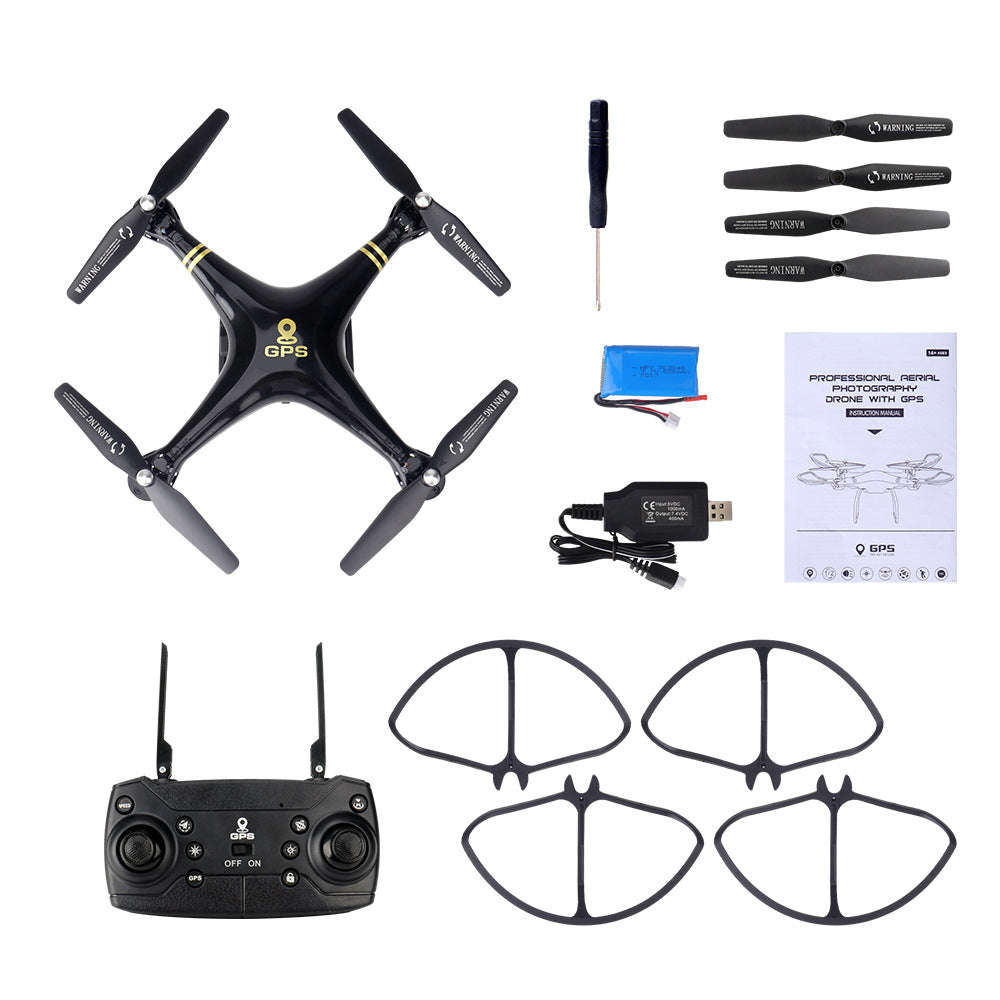 Black quadcopter drone with GPS, controller, extra propellers, and landing guards including battery and charger for aerial photography.